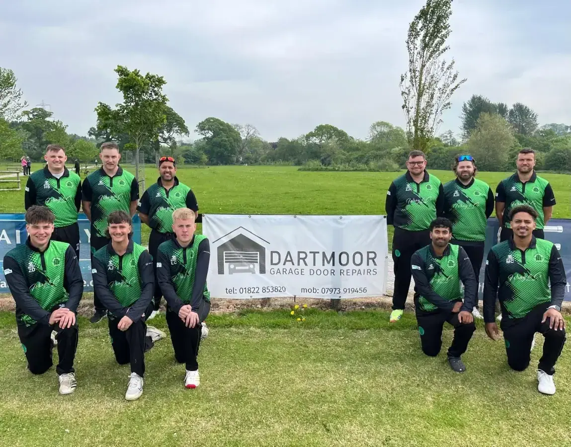 Ivybridge Cricket Club with the Dartmoor Garage Door Repairs sponsor banner
