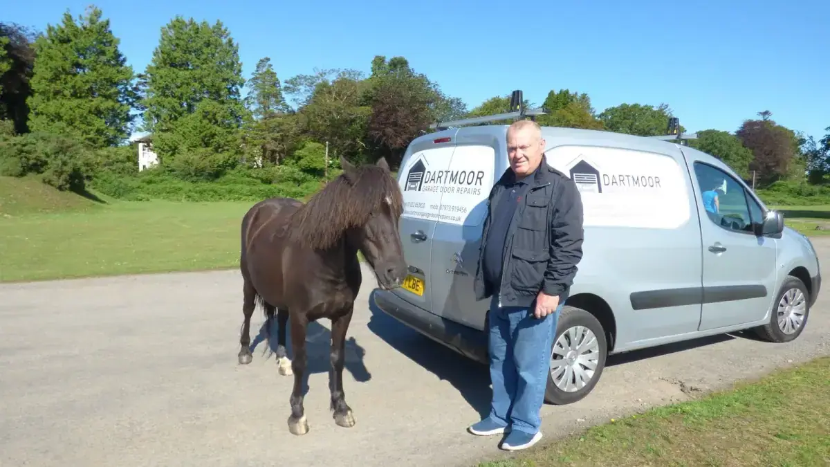 Paul beside the company van